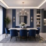 Navy blue velvet dining chairs arranged around a white marble table in a modern room.